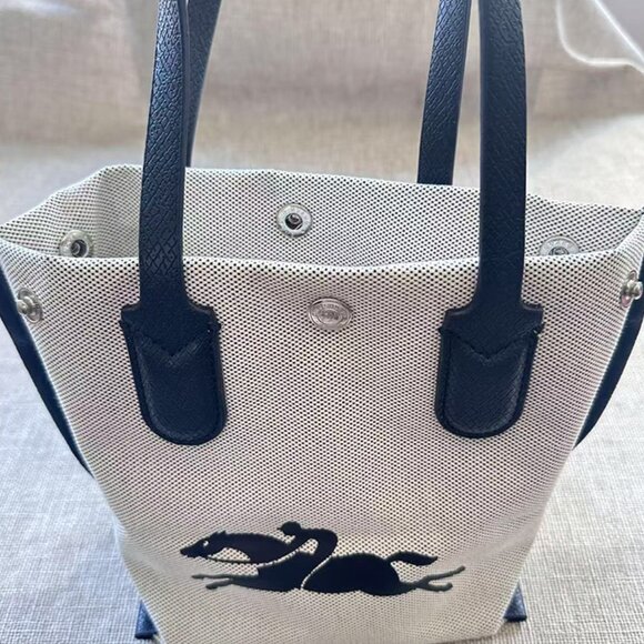 Longchamp Handbags - Longchamp Beige With Black Leather Handle Handbag